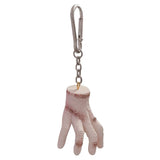Keychain in the shape of a hand with a gold ring on a white background
